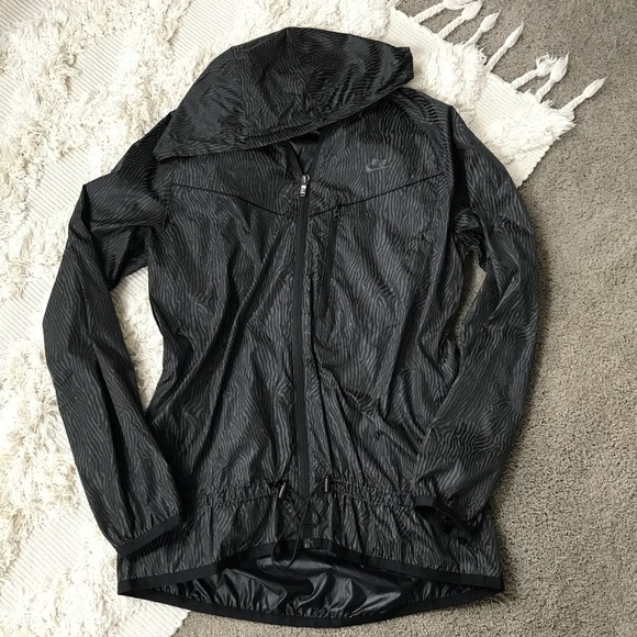 Nike Jackets & Blazers - NIKE black zebra rain jacket zip up
